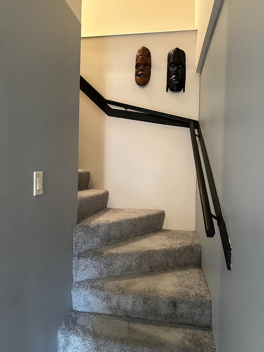 Stairs to bedroom, bathroom and balcony