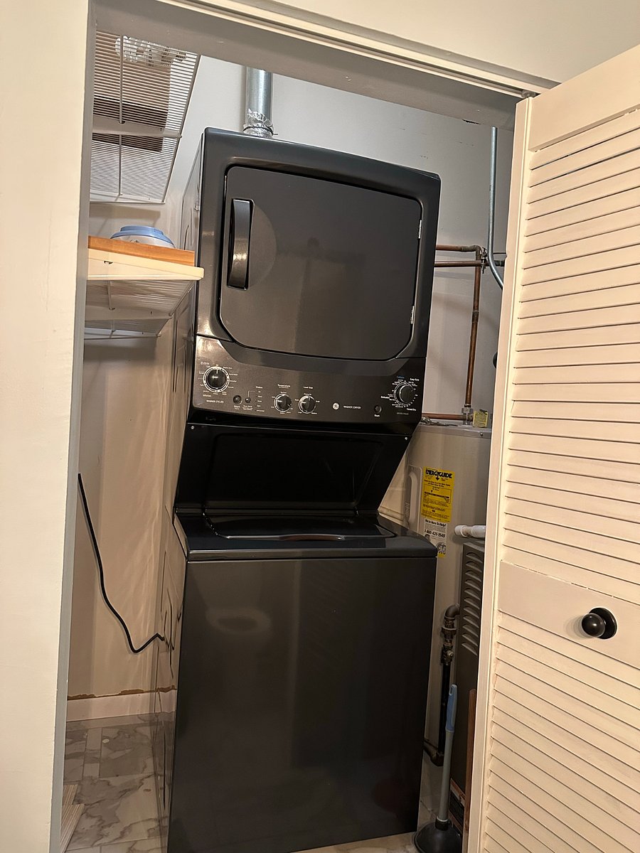 Washer/Dryer in utility closet of bathroom