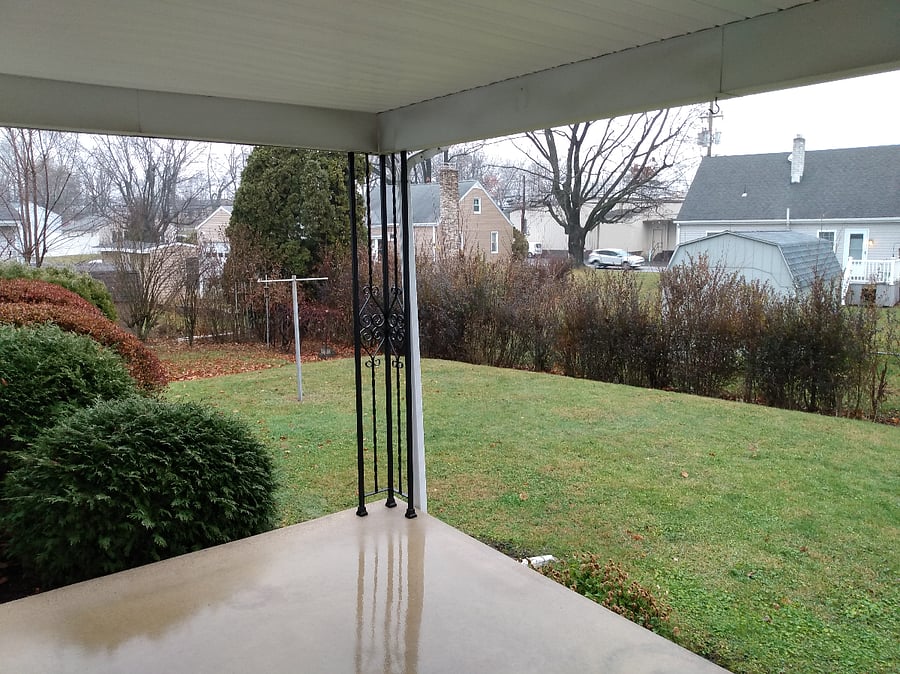 Private backyard with covered porch