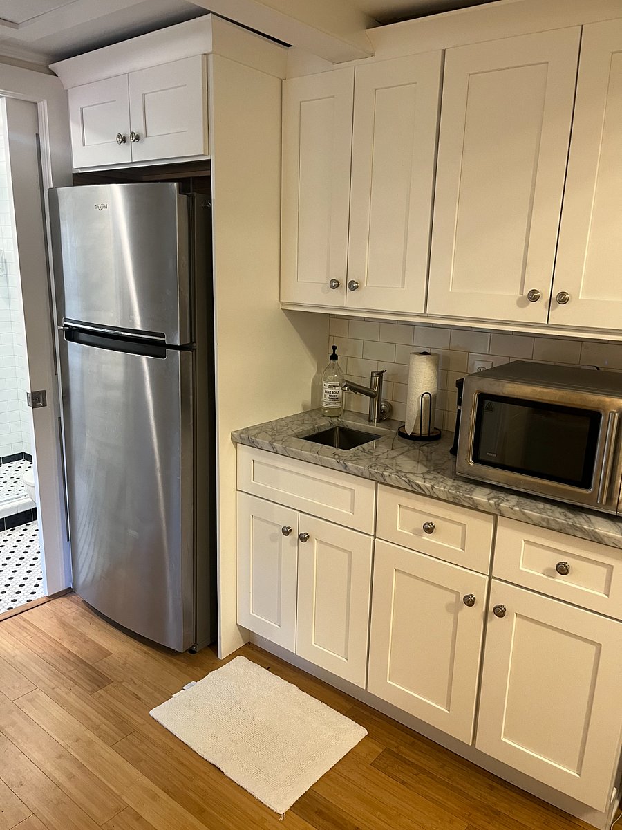 This is the kitchenette, with a full refrigerator, sink, and microwave/airfryer.