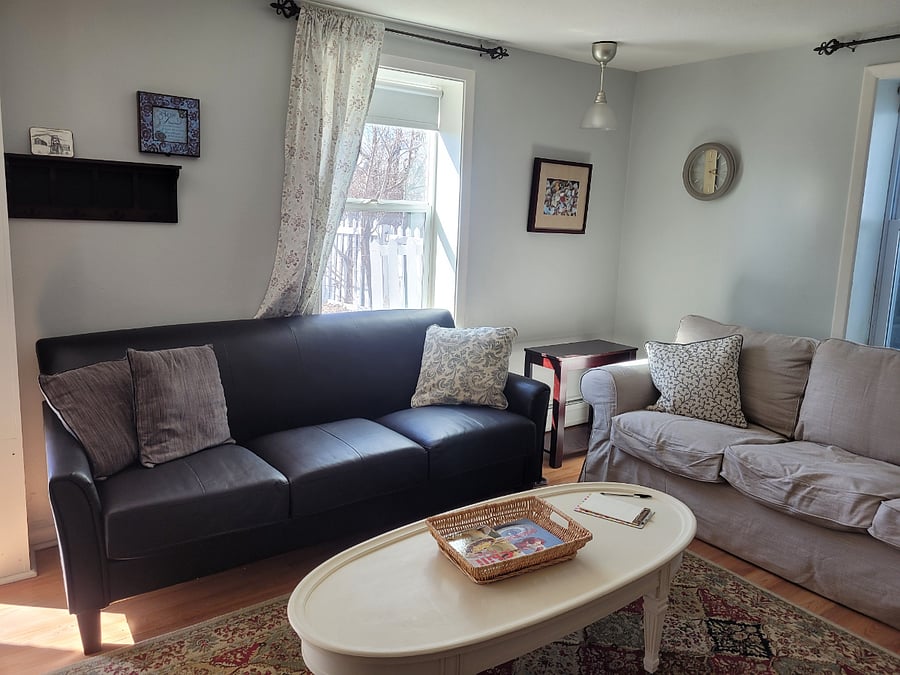 living room opens to fenced back yard