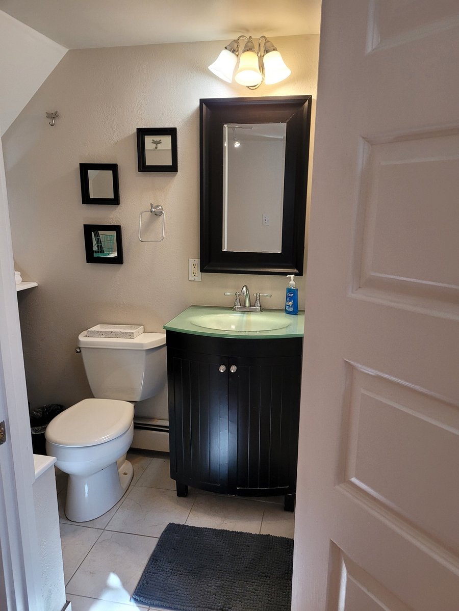 second bathroom -- includes shower with bench