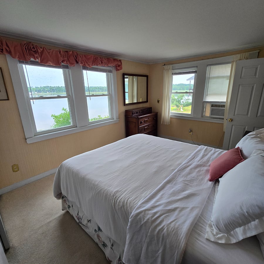 Master bedroom with surrounding views.