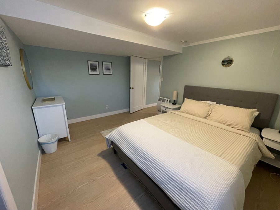 Bedroom with queen bed and large closet space