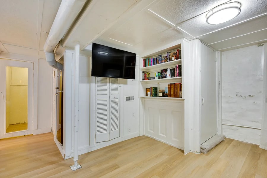 Smart TV swivels out from additional closet for even more storage