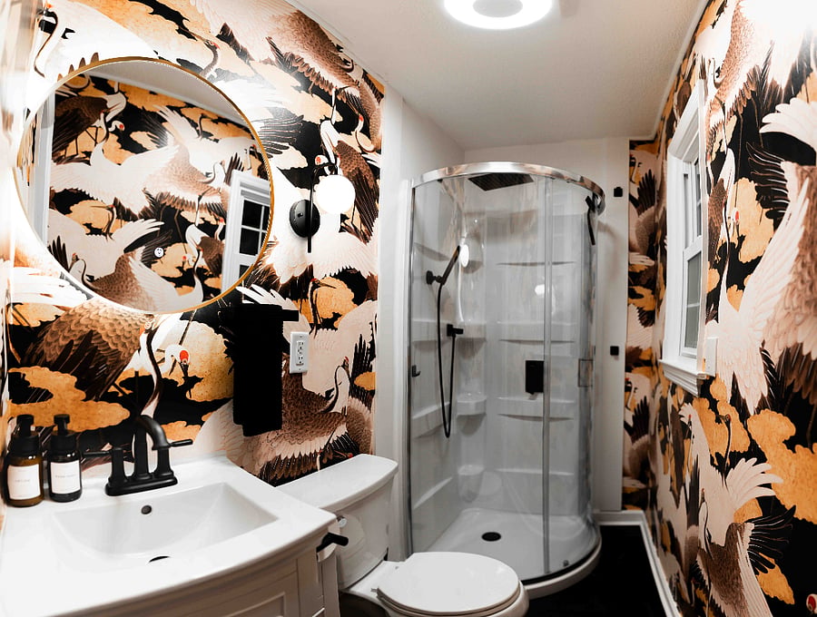 Full bathroom with rainhead shower, handheld sprayer with pressure washer feature.
