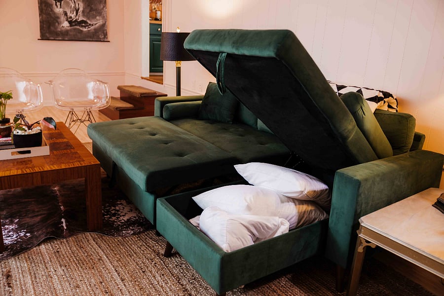 Couch converts to full size bed to accommodate additional guests (8 people max occupancy.)