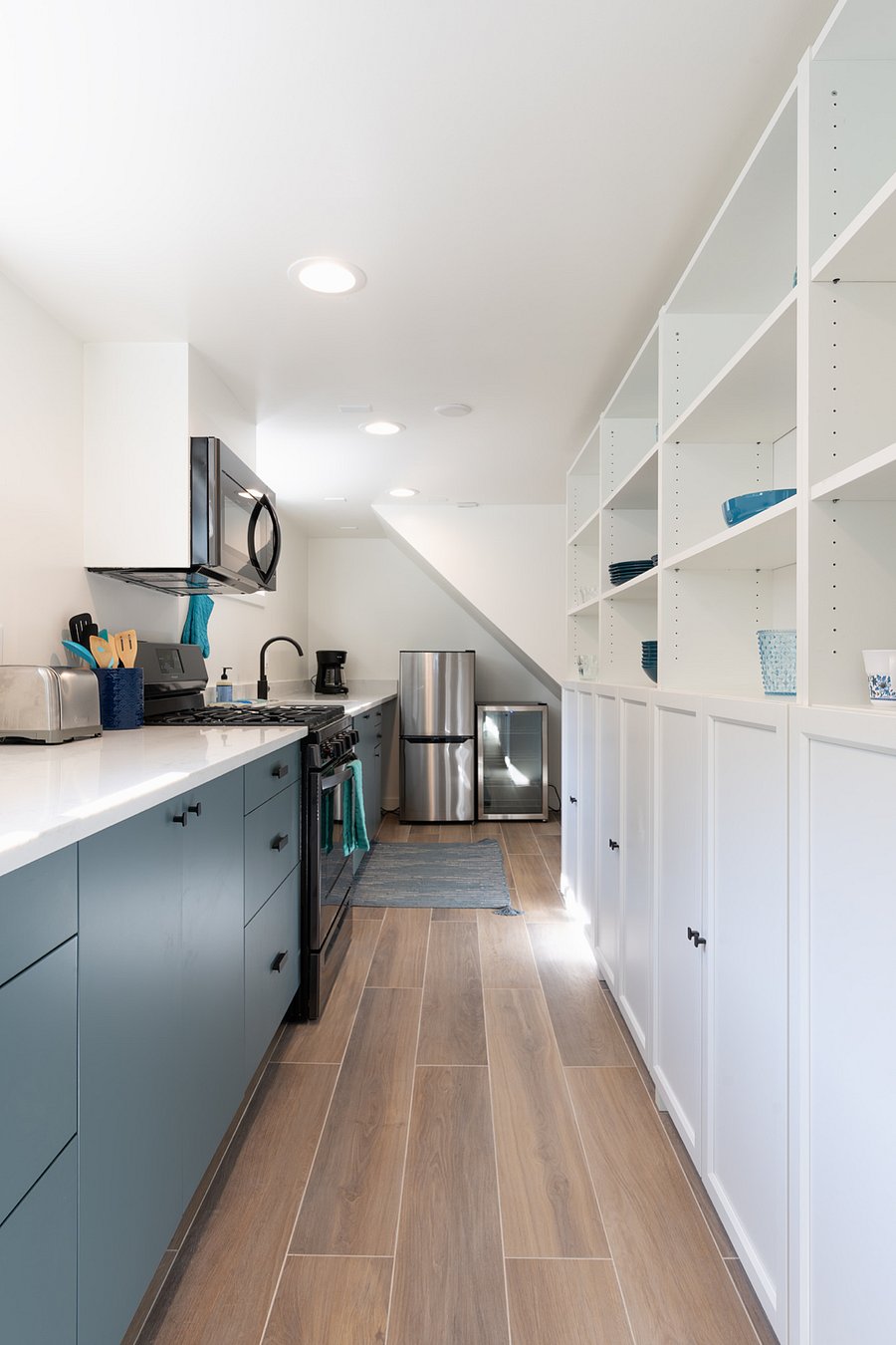 Apartment sized refrigerator/freezer and 115 can beverage fridge for extra capacity.
