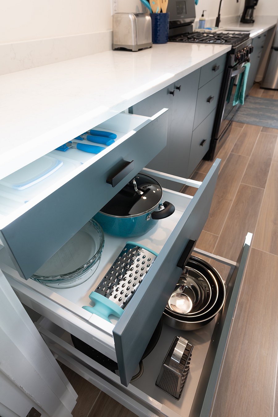 Pots, pie pan and grater. Kitchen has all you need for cooking great meals!