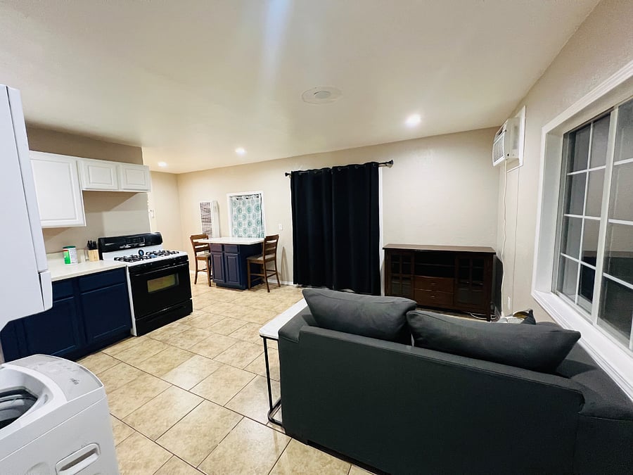 Open living space with blackout curtains for privacy and comfort 