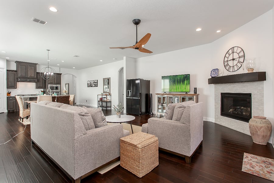 second blk fridge is not included; stainless steel double door fridge by the kitchen island included.