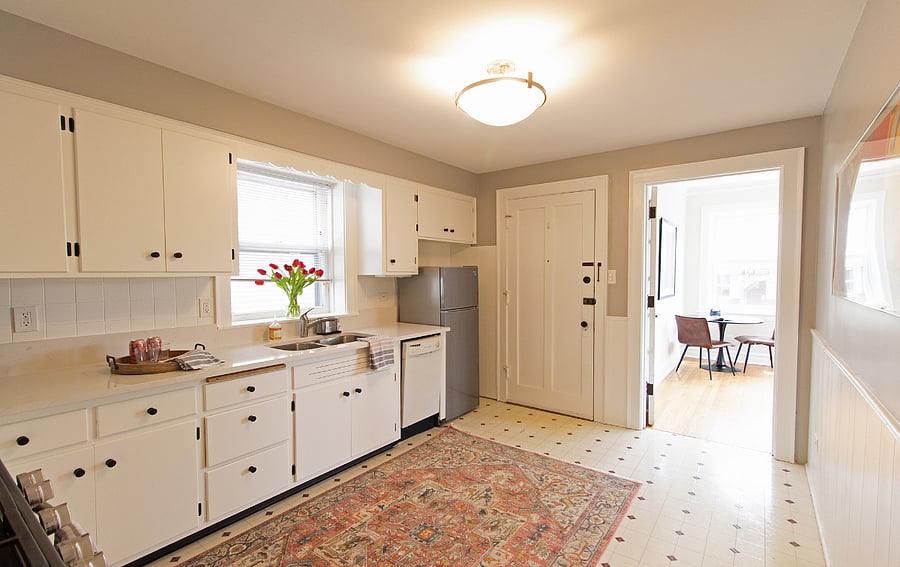 Though the kitchen fridge is small, there is a full-sized fridge in the basement you have access to