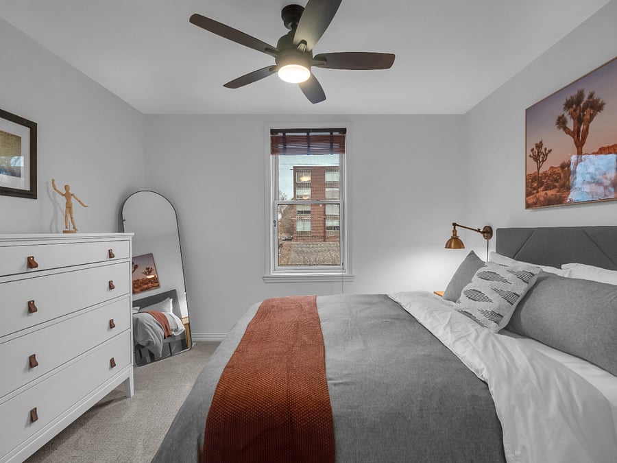 Queen size bedroom also has easy access to private, full bathroom.