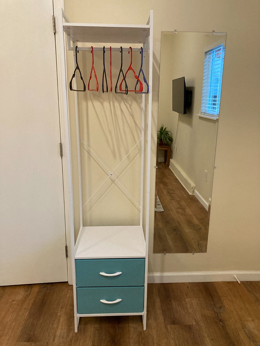 Space for your clothing, in addition to the bed's drawers and another 5-shelf unit.