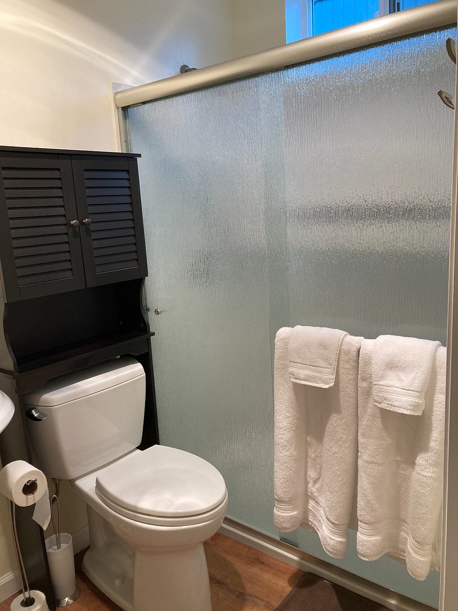 Bathroom has a built-in heat light and fan. Also, I love my own towels so much, I got the same kind for you.