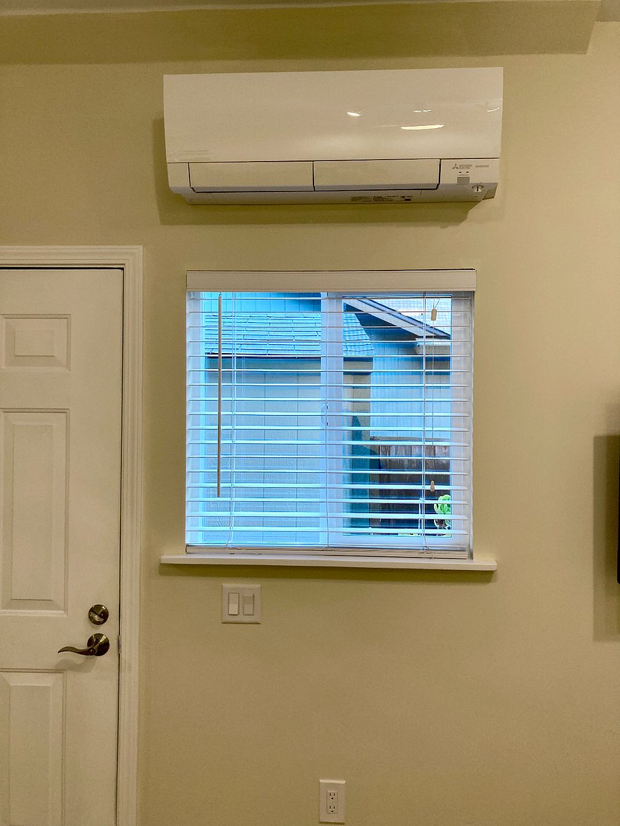 Your own heat/AC system, operated via the wall thermostat or a handheld remote.