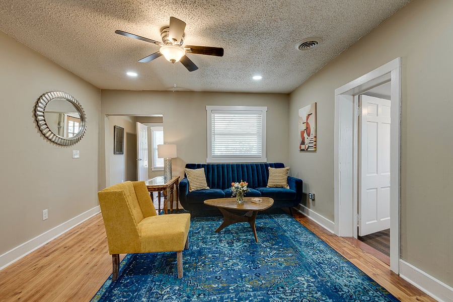 Recently Renovated / Living Room Toward Front Door and Larger Bedroom