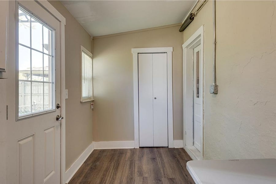 Laundry Room & Back Door leading to Deck and Fenced Backyard