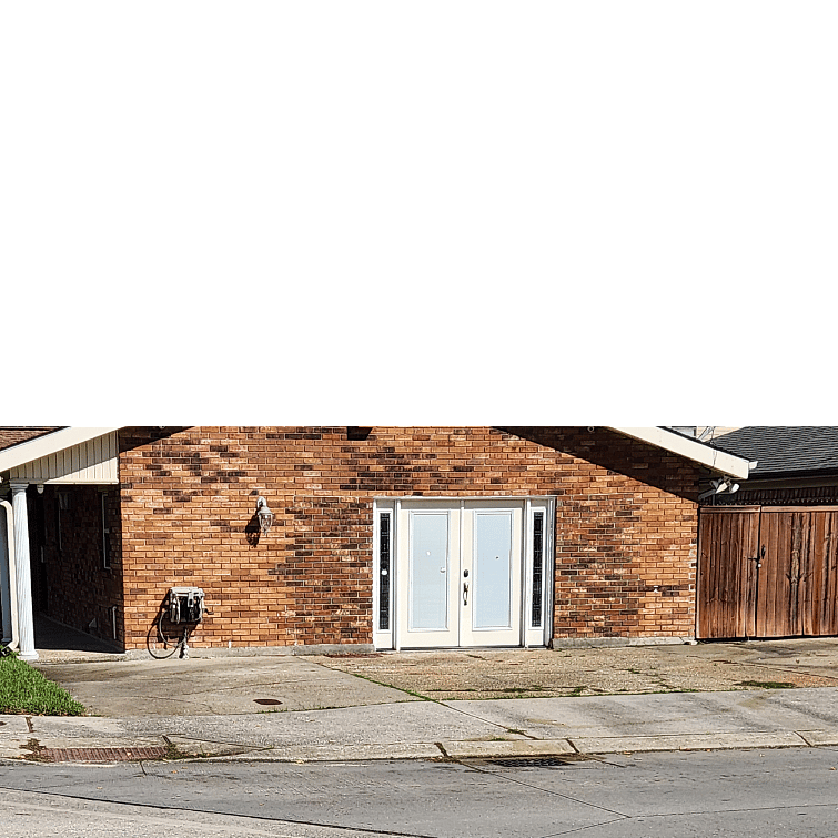 Side entrance. Main parking area.