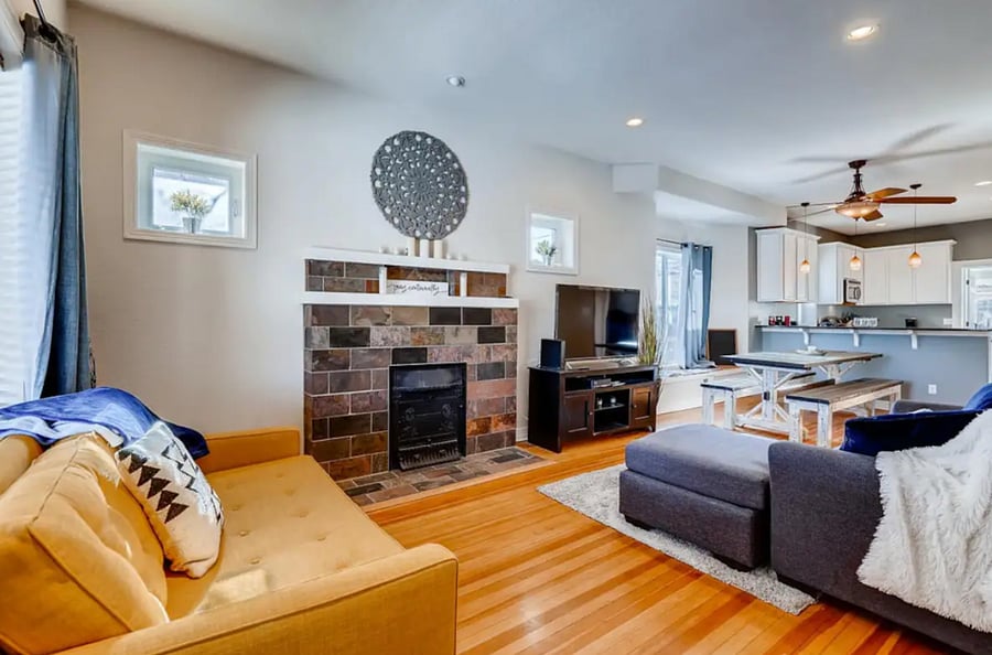 Spacious Front Room with Sectional and Love Seat Couches Open to dining and kitchen area