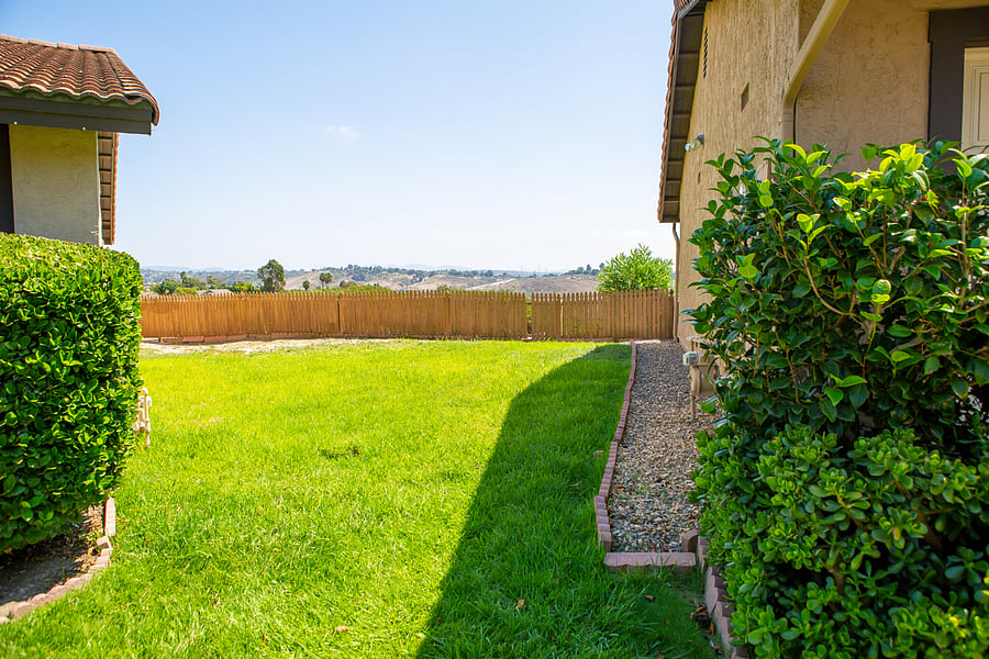 This grassy area is next to the patio on the right and perfect places for your pets
