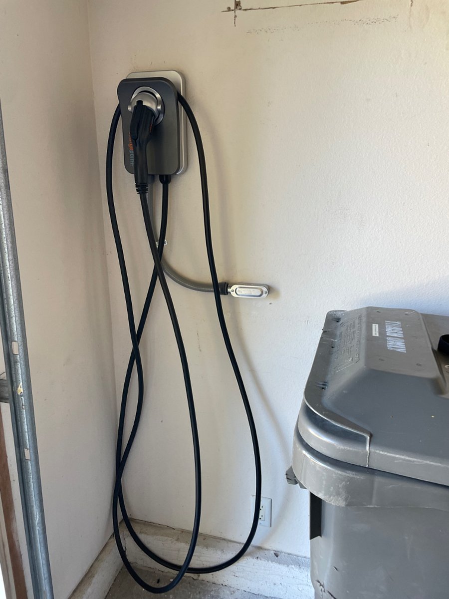 ChargePoint level two EV charger. Teslas need additional attachment not included