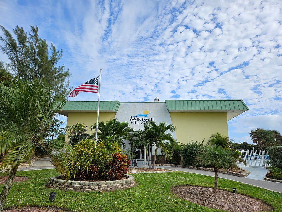 The clubhouse and gym facility on the beach at our Windmill Village community.