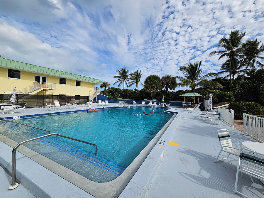 Our large community pool is connected to the beach.