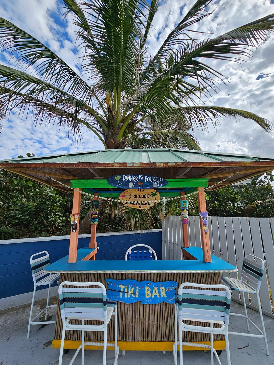 The community tiki hut is at the pool.