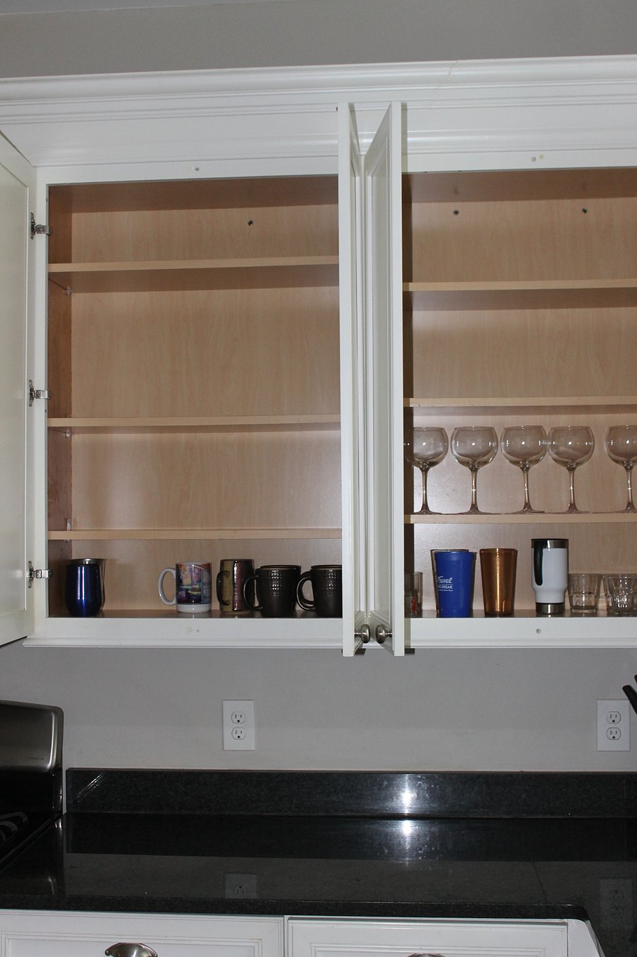 Glassware and extra storage. Lots of cabinet space.