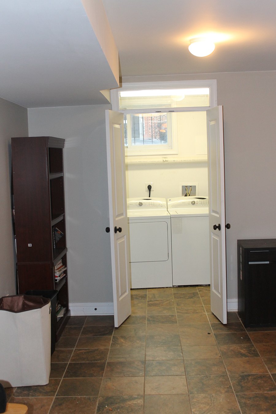 Laundry room and space for office. 