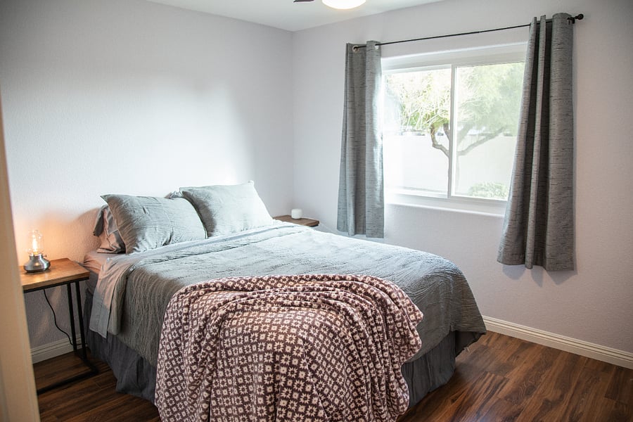 This spare bedroom on the east side of the house has lots of natural morning light!  Black-out curtains if you're a day sleeper.