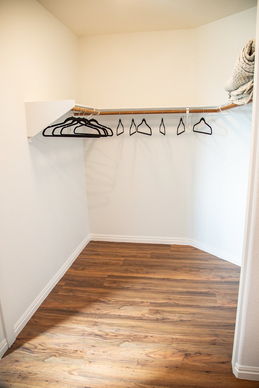 Primary bedroom closet has built-in shelves as well.