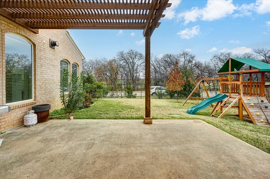 Fenced back yard and patio.
