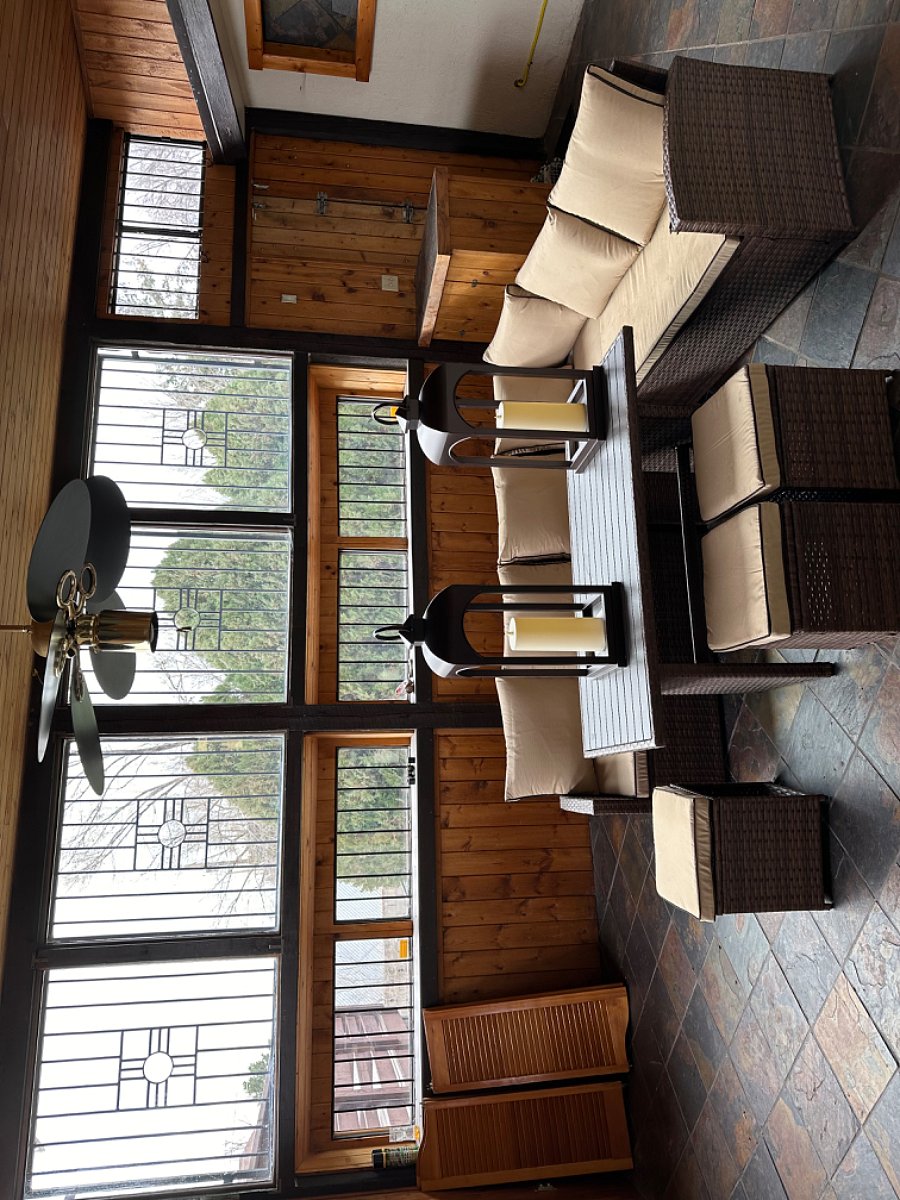 Heated Sunroom with mini-bar.