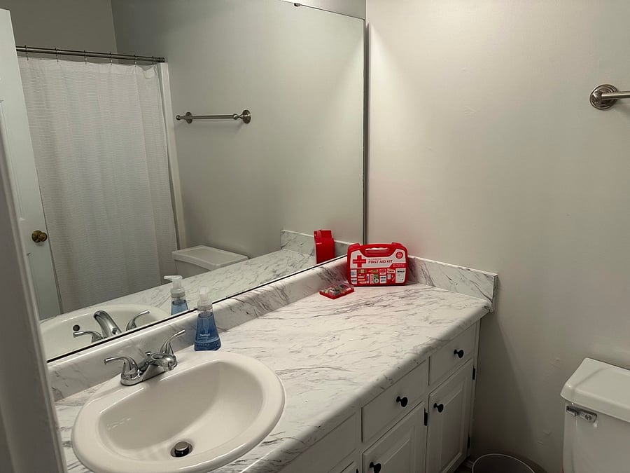 first full bathroom with bath tub / shower.