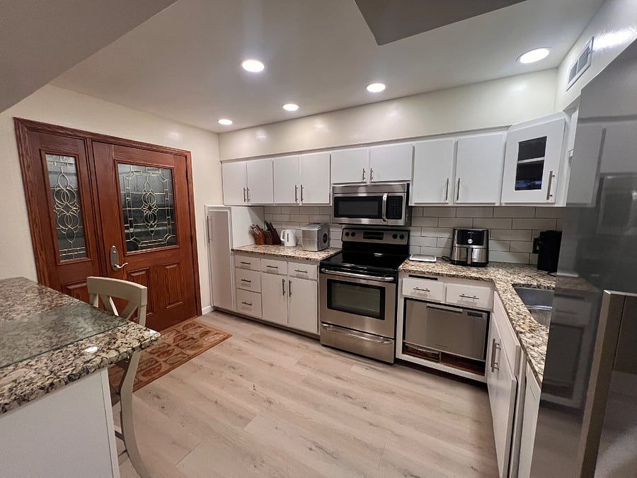 Second kitchen. Downstairs. Walkout to patio with grill, solo stove, outdoor seating and hot tub.