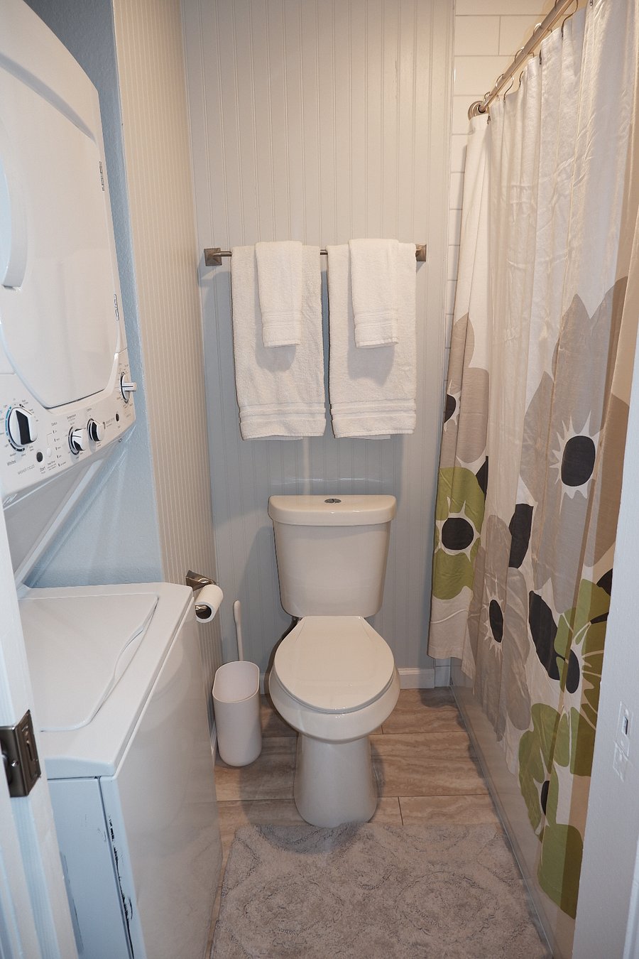 Updated bathroom with washer and dryer. 
