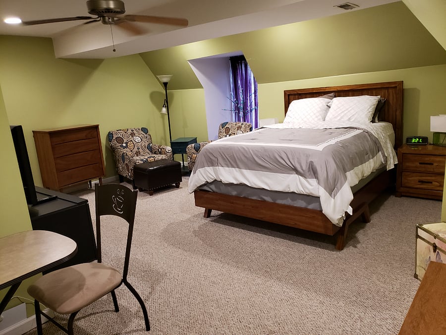 Spacious bedroom includes sitting area