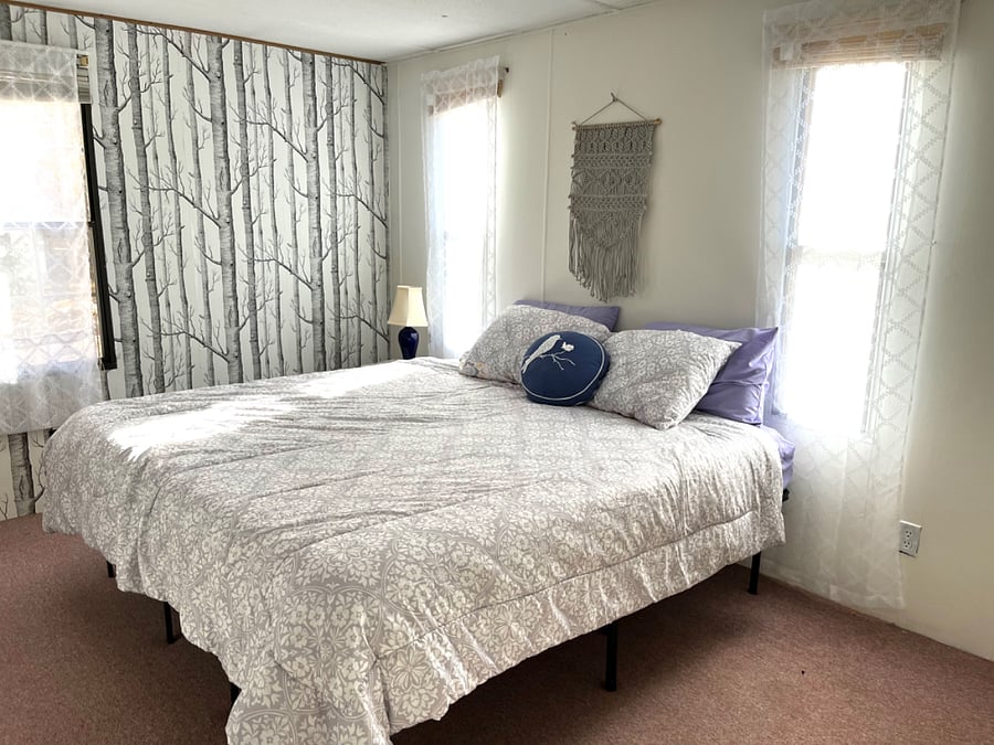 The master bedroom has a comfortable "Purple Mattress" brand bed. It is very quiet, great for sleeping!