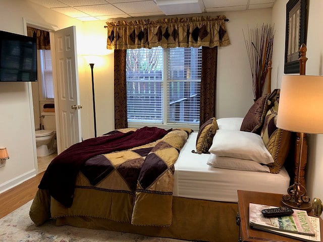Full Bedroom - With Queen Bed, Dresser, Night Stand, Mirror and Washer-Dryer in Walk-in Closet.