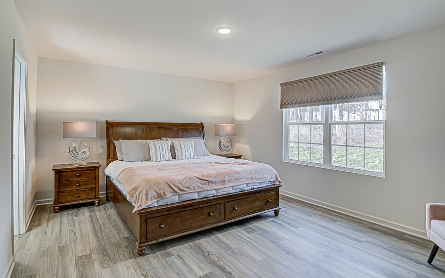 Master Suite with walk-in dressing room and bathroom with walk-in shower