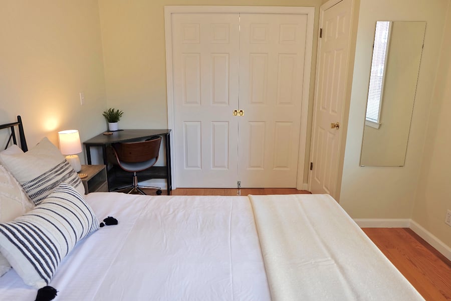 Pocket style doors and a closet in Bedroom 1