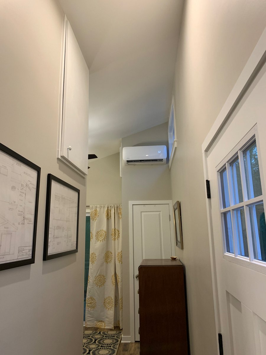 The tiny home features vaulted ceilings and lots of natural light