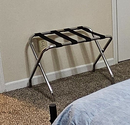 Luggage stand in each bedroom.