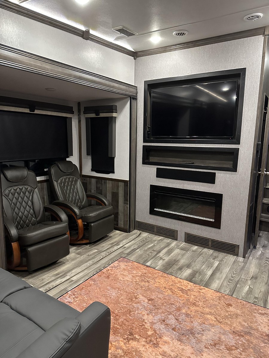 Fireplace underneath TV.