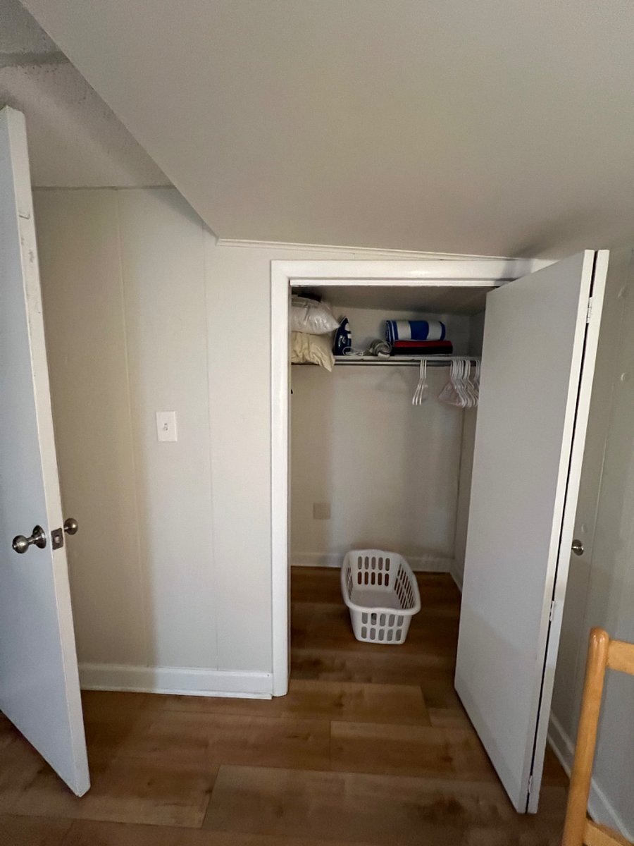 Closet, laundry basket, iron, beach towels, extra pillows.