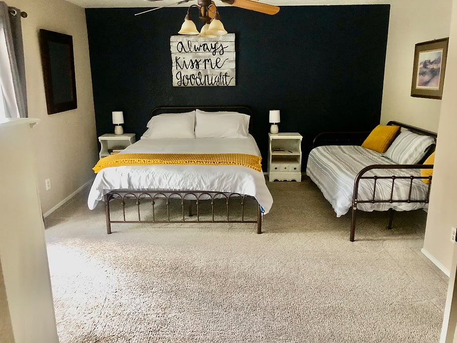 Master bedroom with comfy king bed and twin day bed