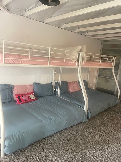 Third bedroom with two bunk beds, ideal for a family. 