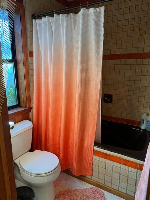 Huge bath tub. Yes, chocolate brown and we find it endearing and comfortable.

